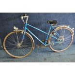 A VINTAGE LADIES PEUGEOT BICYCLE in good condition