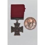AN 80TH BIRTHDAY SIR WINSTON CHURCHILL COMMEMORATIVE COPPER MEDALLION AND A COPPER 'FOR VALOUR'