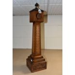 A CARVED WOODEN CLOCK/ POCKET WATCH CASE IN THE FORM OF A CLOCK TOWER, dated 1893 to the base,