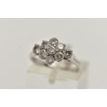 AN 18CT WHITE GOLD DIAMOND CLUSTER RING, of a marquise outline, set with nine round brilliant cut