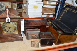 A MANTEL CLOCK AND VARIOUS WOODEN BOXES, comprising a wooden cased mantel clock, carved with