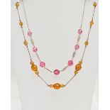 TWO PASTE SET NECKLACES, the first set with faceted pink paste interspaced with colourless paste,