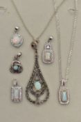 TWO PENDANT NECKLACES AND FOUR PENDANTS, the first pendant of an openwork tear drop shape, set