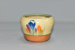 A CLARICE CLIFF CROCUS PATTERN MARMALADE POT, painted with purple, blue and orange crocuses, green