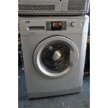 A BEKO WMB715435S WASHING MACHINE measuring width 60cm x depth 54cm x height 85cm (PAT pass and