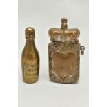 TWO LATE VICTORIAN BRASS VESTA CASES, the first in the form of a bottle of 'Veuve Clicquot'