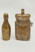 TWO LATE VICTORIAN BRASS VESTA CASES, the first in the form of a bottle of 'Veuve Clicquot'