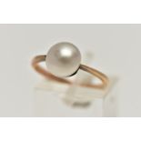 A YELLOW METAL CULTURED PEARL RING, baroque cultured pearl (loose in setting, visible adhesive),