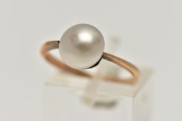 A YELLOW METAL CULTURED PEARL RING, baroque cultured pearl (loose in setting, visible adhesive),