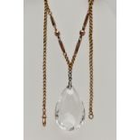 AN EARLY 20TH CENTURY ROCK CRYSTAL PENDANT, TOGETHER WITH A VICTORIAN CHAIN, the faceted rock
