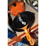 THREE LE CREUSET PANS, in orange, comprising a covered saucepan with pouring spout, diameter 20cm,