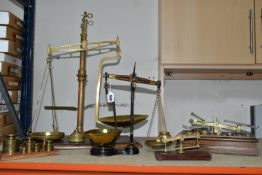 FOUR SETS OF VICTORIAN BALANCE SCALES, and a set of brass weights, a W.Wilcock & Co. Chorley egg and
