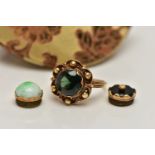 A 14CT GOLD, INTERCHANGABLE GEMSTONE RING, of a flower shape with beaded detail, to the centre is