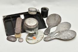 A BOX OF SILVER BACKED AND SILVER MOUNTED DRESSING TABLE ITEMS, including a well used four piece