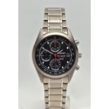 A 'SEIKO' TITANIUM WRISTWATCH, quartz movement, round dial signed 'Seiko chronograph titanium 100m',