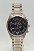 A 'SEIKO' TITANIUM WRISTWATCH, quartz movement, round dial signed 'Seiko chronograph titanium 100m',