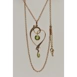 A YELLOW METAL GEM SET LAVALIER PENDANT NECKLACE, the openwork heart shaped pendant, set with a