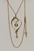 A YELLOW METAL GEM SET LAVALIER PENDANT NECKLACE, the openwork heart shaped pendant, set with a