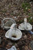 A PAIR OF COMPOSITE GARDEN PLANTERS, in the style of a wicker basket with a handle, approx. height