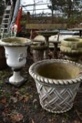 A PAINTED WEATHERED COMPOSITE GARDEN PLANTER, with a rope rim and lattice design, 53cm diameter x