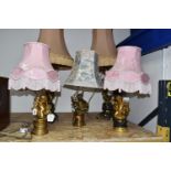 FIVE FIGURAL TABLE LAMPS, comprising a pair of cast metal and marble table lamps, each cast with