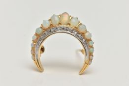 AN 18CT GOLD OPAL AND DIAMOND CRESCENT BROOCH, set with a row of graduated oval and circular cut