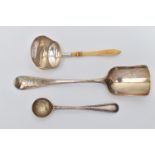 TWO 19TH CENTURY SILVER CADDY SPOONS AND A BEAD PATTERN CONDIMENT SPOON, one caddy spoon with