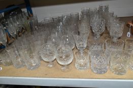 A COLLECTION OF CUT CRYSTAL AND OTHER DRINKING GLASSES, over seventy glasses to include seven sets