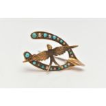 A LATE VICTORIAN GOLD TURQUOISE AND SPLIT PEARL BROOCH, designed as a wishbone set with