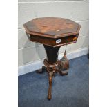 A LATE VICTORIAN WALNUT OCTAGONAL TRUMPET SEWING TABLE, with a chess board lid, that's enclosing a