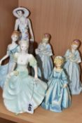A GROUP OF PORCELAIN LADIES, comprising a Norcroft 'Madison New Yorker', and 'Tina'(reglued left