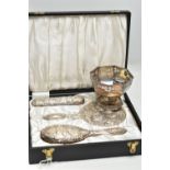 A CASED ELIZABETH II SILVER MOUNTED FOUR PIECE DRESSING TABLE SET AND A GEORGE V SILVER OCTAGONAL