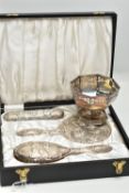 A CASED ELIZABETH II SILVER MOUNTED FOUR PIECE DRESSING TABLE SET AND A GEORGE V SILVER OCTAGONAL