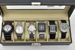 A WATCH DISPLAY CASE WITH SIX GENTS WRISTWATCHES, to include 'G-Shock, Slazenger, AL, Storm,