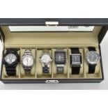 A WATCH DISPLAY CASE WITH SIX GENTS WRISTWATCHES, to include 'G-Shock, Slazenger, AL, Storm,