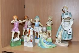 SEVEN ROYAL WORCESTER FIGURES, comprising Upstairs Downstairs - the Cook, depicting the cook