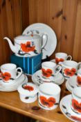 A WEDGWOOD 'CORNPOPPY' C2176 PATTERN TEA SET, a Susie Cooper design comprising sugar bowl, milk jug,