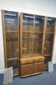 AN ERCOL WIDSOR ELM DISPLAY CABINET, with an arrangement of four sections, width 188cm x depth