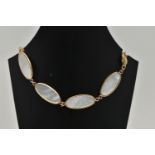 A 9CT GOLD MOTHER OF PEARL BRACELET, designed as a series of seven oval mother of pearl panels, each