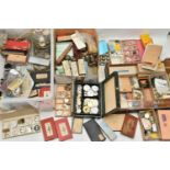 A LARGE ASSORTMENT OF WATCH PARTS, SPARES AND REPAIRS, to include watch movements, dials, cogs,