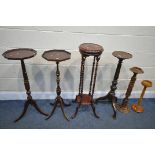 FOUR VARIOUS PLANT/TORCHERE STANDS, to include a circular barley twist stand, height 98cm, and two