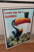 A REPRODUCTION GUINNESS ADVERTISING POSTER, box canvas, published by Pyramid Posters, approximate