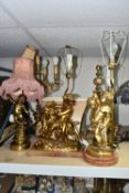SIX FIGURAL TABLE LAMPS, to include a table lamp cast with two putti on a marble plinth, height to