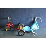 A SCHWINN CHILDS TRICYCLE, in overall good condition-some water damage to wooden panel to rear,