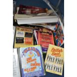 TWO BOXES OF OFFICIAL LIVE MUSIC PROGRAMMES AND POSTERS, dating from the 1980's to include