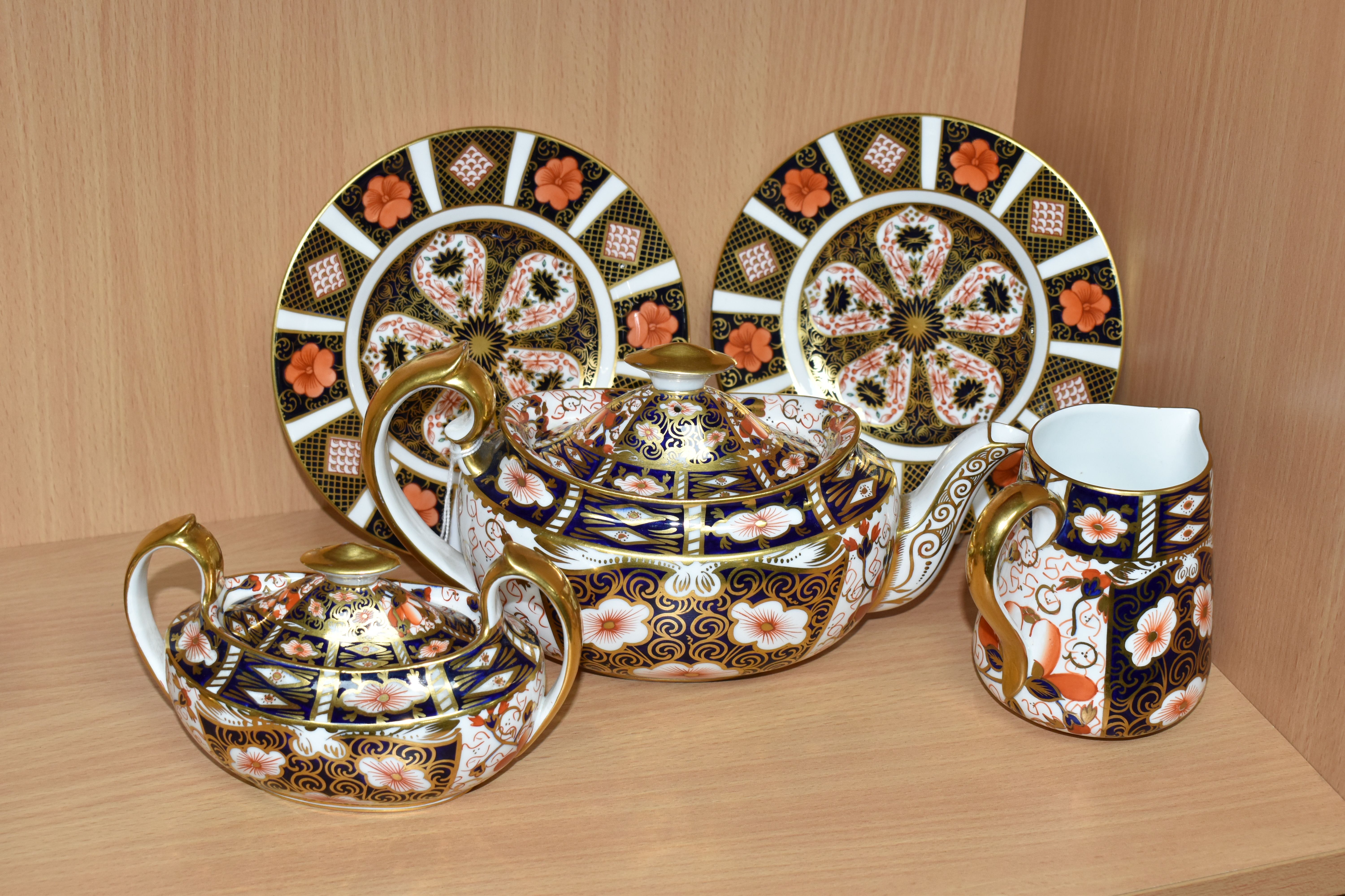 A GROUP OF ROYAL CROWN DERBY IMARI TEAWARES, comprising a 2451 pattern teapot, cream jug and covered