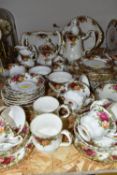 A SIXTY THREE PIECE ROYAL ALBERT 'OLD COUNTRY ROSES' DINNER SERVICE, comprising a teapot, a coffee