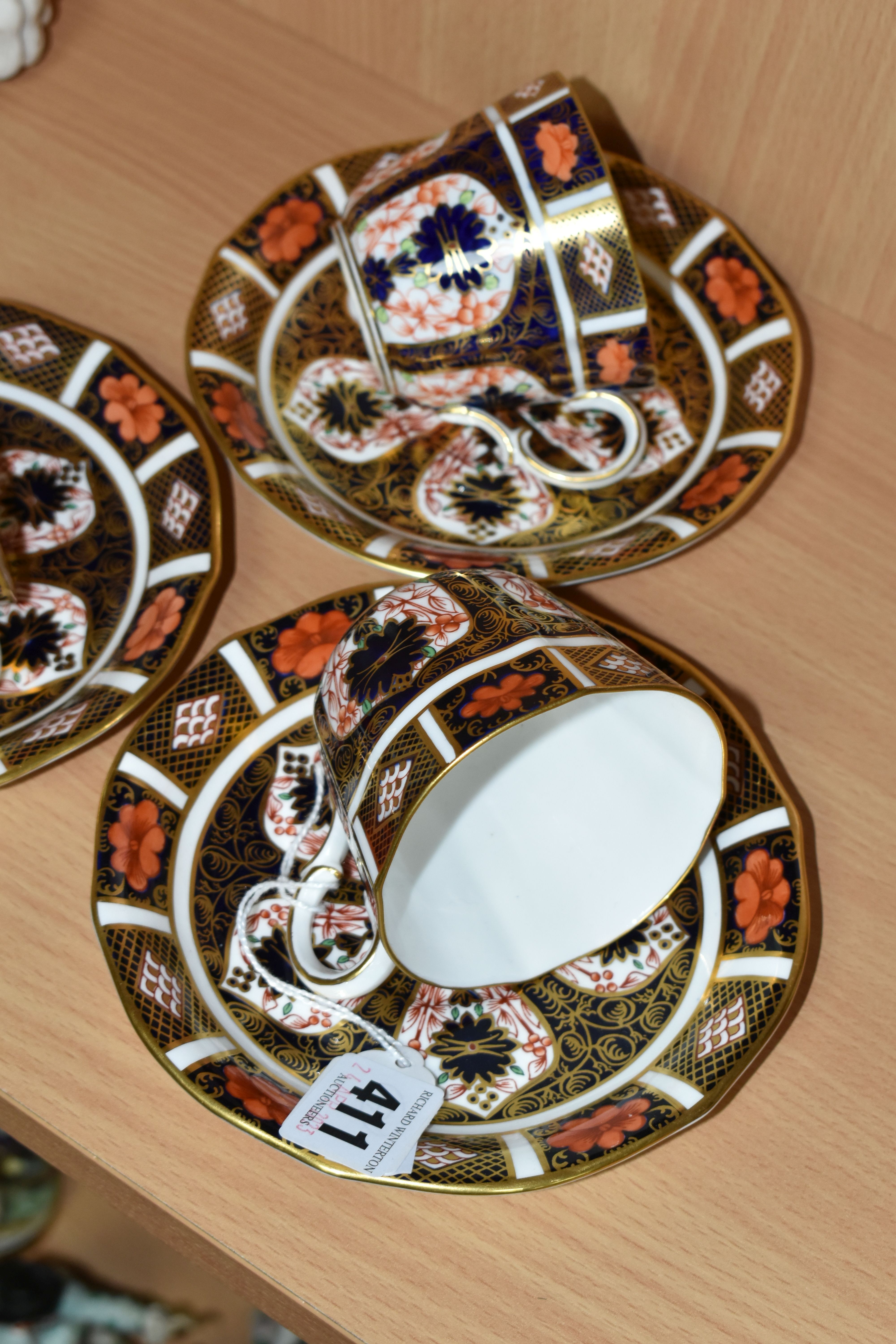 THREE ROYAL CROWN DERBY IMARI 1128 TEACUPS AND SAUCERS, having red printed backstamps, most pieces - Image 3 of 4