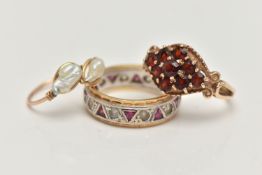 THREE RINGS, to include a 9ct gold garnet cluster ring, of a marquise form, bead and scroll work