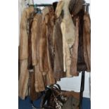 ONE RAIL OF LADIES' FUR COATS AND HANDBAGS, to include thirteen coats and jackets, three are faux